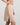 Model wears Understatement Slip in LATTE. On body side view