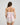 Model wears Dreamer Camisole in PALE LILAC. On body back view