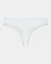 Model wears Cotton Logo Thong in WHITE. On body front view