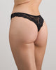 Model wears My Fit Lace Thong in BLACK. On body front view