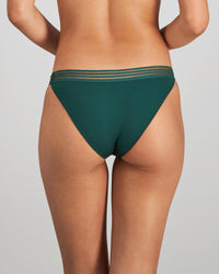 Model wears Stripe Elastic & Papertouch Tanga in RAIN FOREST. On body back view