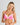 Model wears Nikki Wire Free Bra in SHOCKING PINK/WHITE. On body front view