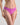 Model wears Seamless Soft Thong in RADIANT ORCHID. On body side view
