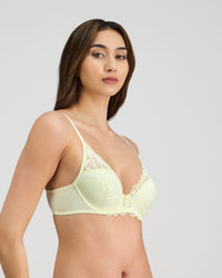 Model wears Embrace Contour Bra in TRANSPARENT YELLOW. On body side view