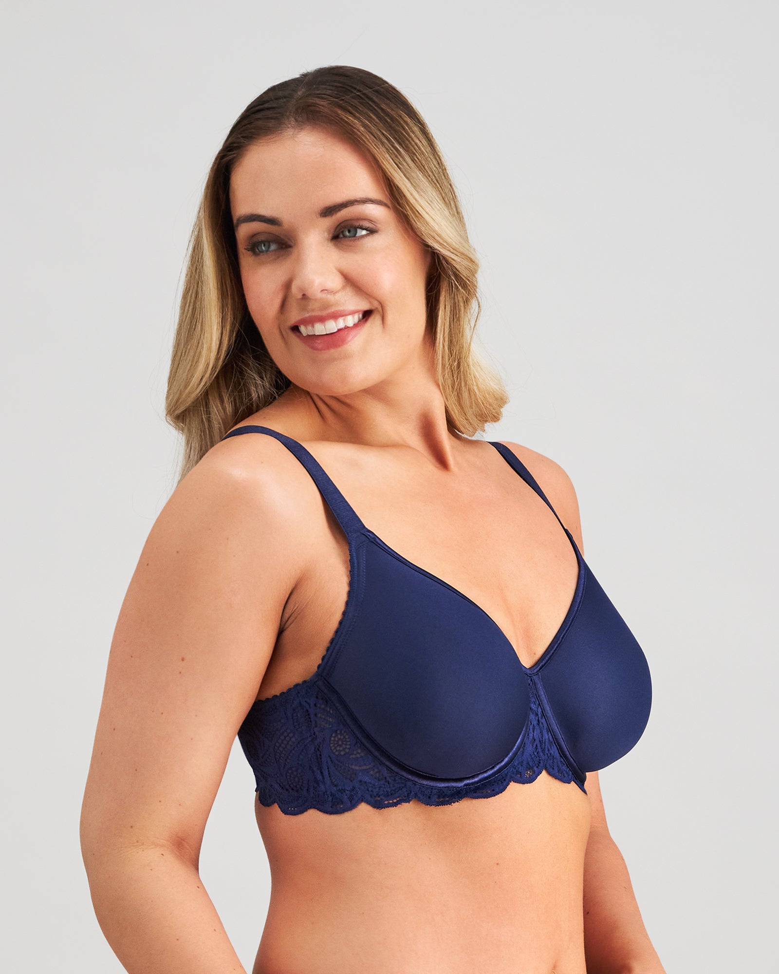 Model wears Lace Perfect Contour Bra in Medieval Blue. On body side view