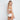 Model wears Sun Burst Bralette in WHITE. On body back view