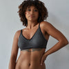 Model wears Elodie Maternity Bra in JET/PEWTER. On body front view