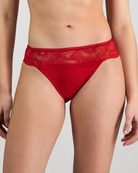 Model wears Lumiere Bikini in SALSA. On body front view