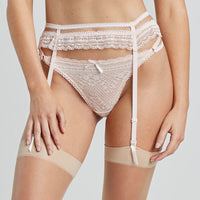 Model wears Gia Suspender in HEAVENLY PINK. On body front view