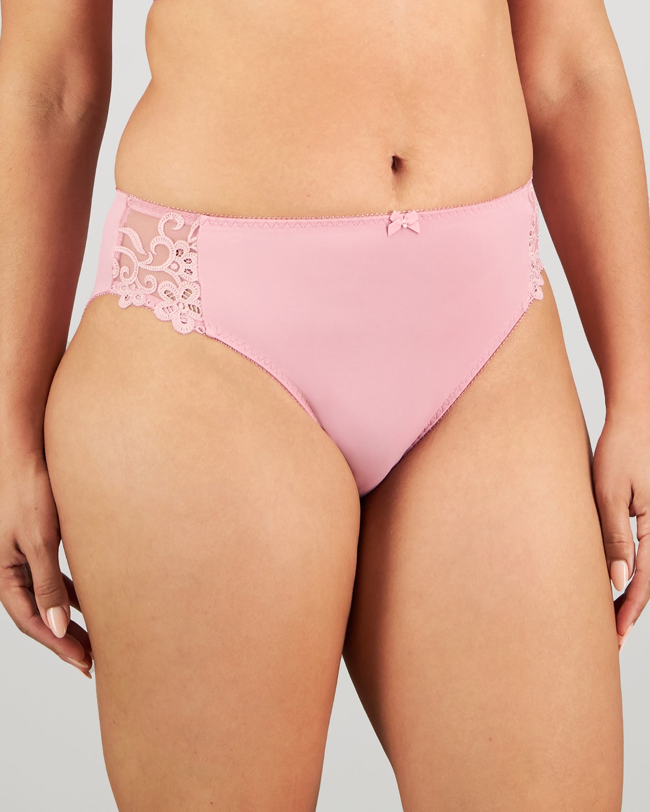 Model wears Coral High Cut Brief in LILAS. On body side view