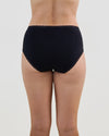 Model wears Stretch Cotton Full Brief in BLACK. On body back view