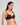 Model wears Rita Contour Bra in PLUM PERFECT. On body side view