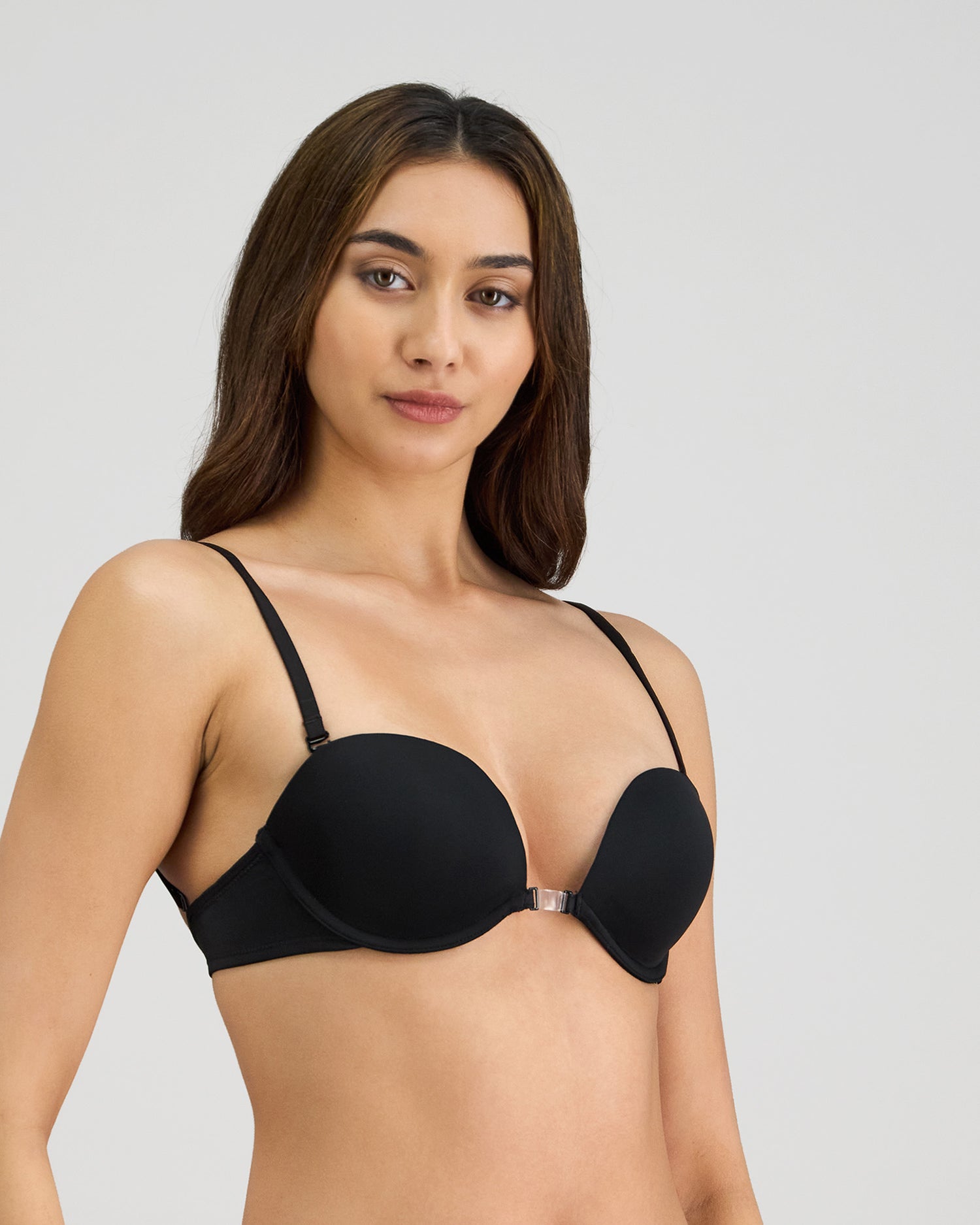 Model wears Infinity Multiway Convertible Bra in BLACK. On body side view