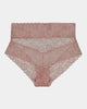 Model wears Lace Full Brief in MOCHA. On body front view