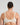 Model wears Classic Underwire Underwire Bra in IVORY. On body back view