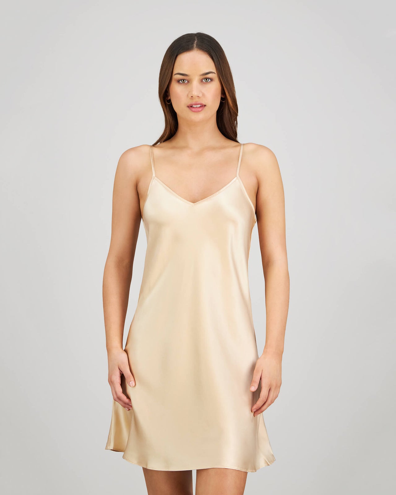 Model wears Silk Brilliance Chemise in CHAMPAGNE. On body front view