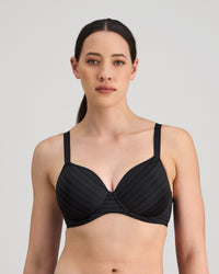 Model wears Rita Contour Bra in BLACK. On body front view