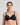 Model wears Rita Contour Bra in BLACK. On body front view