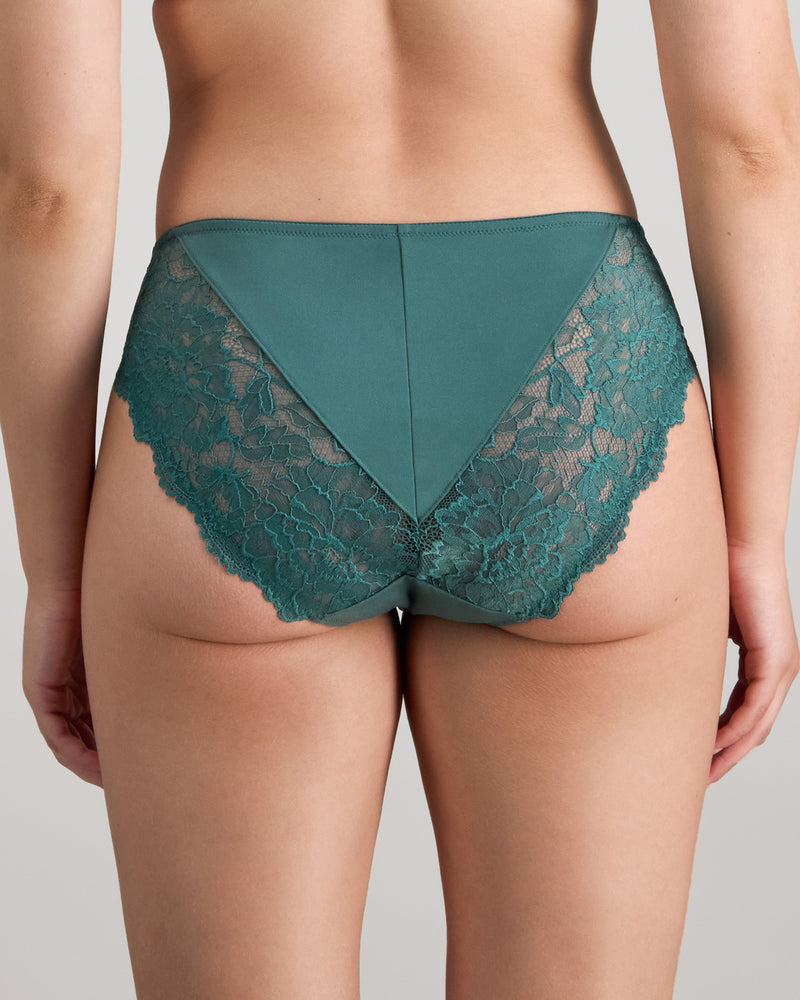 Model wears Laurel High Cut Brief in MEDITERRANEA. On body back view