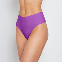 Model wears No Show Thong in AMETHYST ORCHID. On body front view