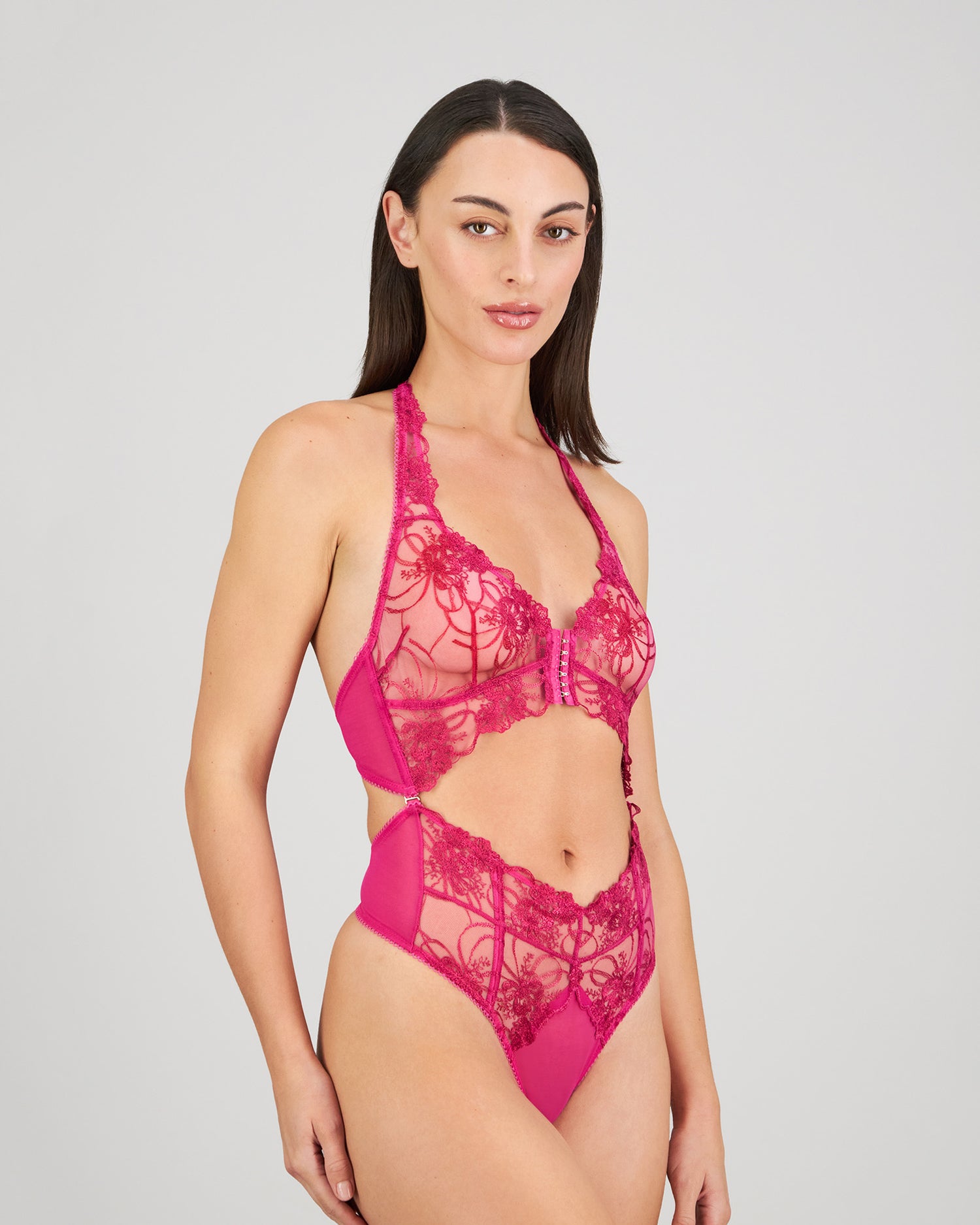 Model wears Heritage Bloom Bodysuit in FANTASY FUCHSIA. On body side view