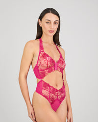 Model wears Heritage Bloom Bodysuit in FANTASY FUCHSIA. On body side view
