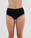 Model wears Stretch Cotton Full Brief in BLACK. On body front view
