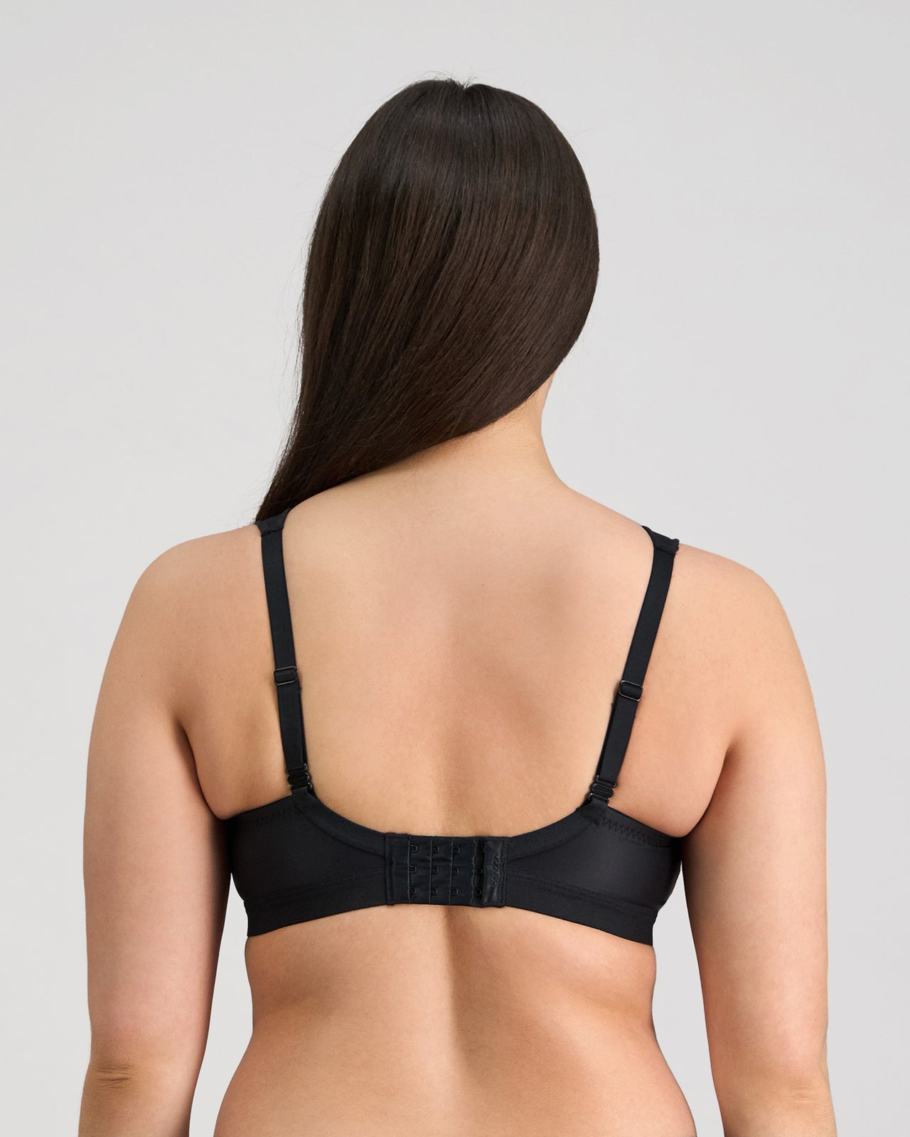 Stamina Wire Free Bra in BLACK. Flat lay back view
