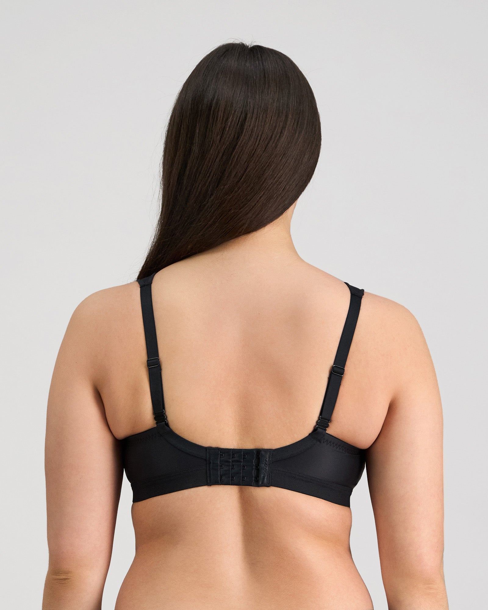 Stamina Wire Free Bra in BLACK. Flat lay back view