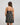 Model wears Lost Paradise Chemise in BLACK PRINT. On body back view