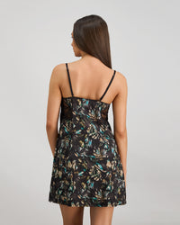 Model wears Lost Paradise Chemise in BLACK PRINT. On body back view