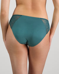 Model wears Coco Divine Bikini in MEDITERRANEA. On body back view