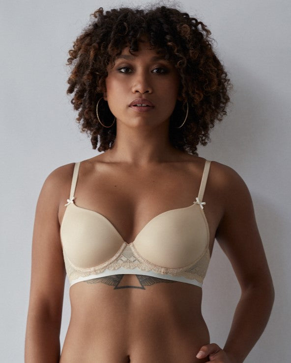 Model wears Geometric Lace Contour Bra in TOASTED ALMOND/PRISTINE. On body front view