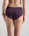 Model wears Au Naturel Full Brief in PLUM PERFECT. On body back view
