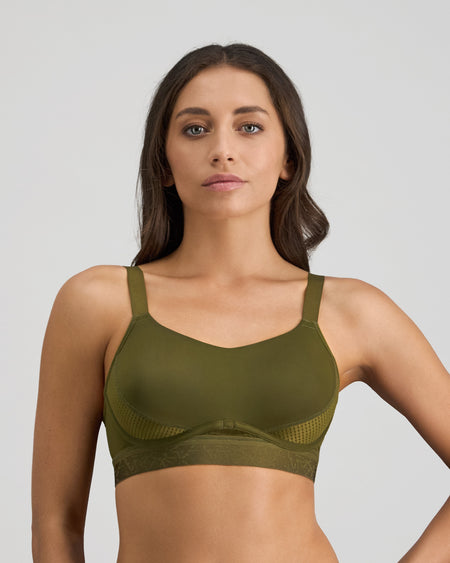 Model wears Bendon Breathe Contour Bra in DARK OLIVE/PINK. On body front view