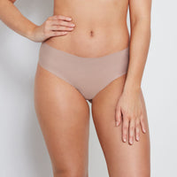 Model wears No Show Bikini in MOCHA. On body front view