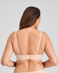 Model wears Comfit Collection Wire Free Bra in LATTE. On body back view