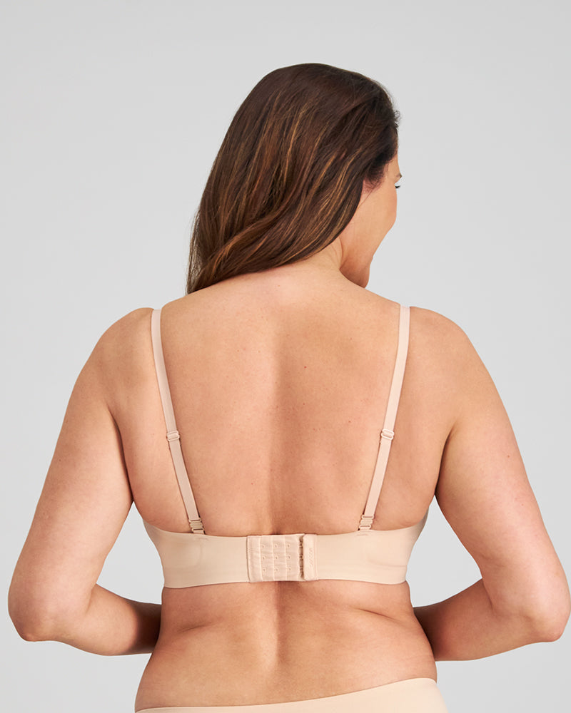 Model wears Comfit Collection Wire Free Bra in LATTE. On body back view