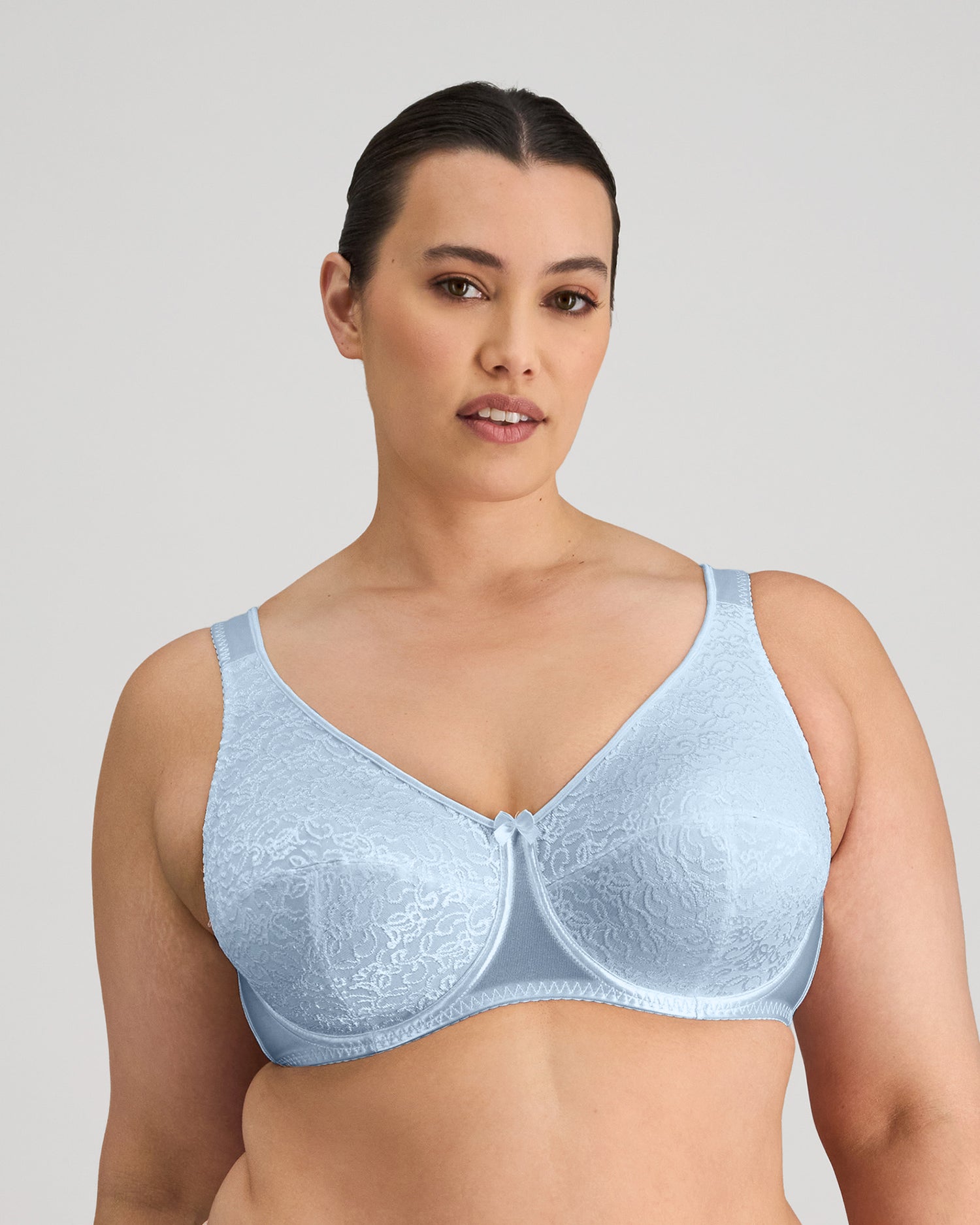 Model wears Charlotte Underwire Bra in SKYWAY. On body front view