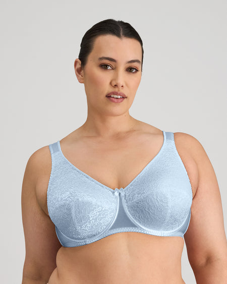 Model wears Charlotte Underwire Bra in SKYWAY. On body front view