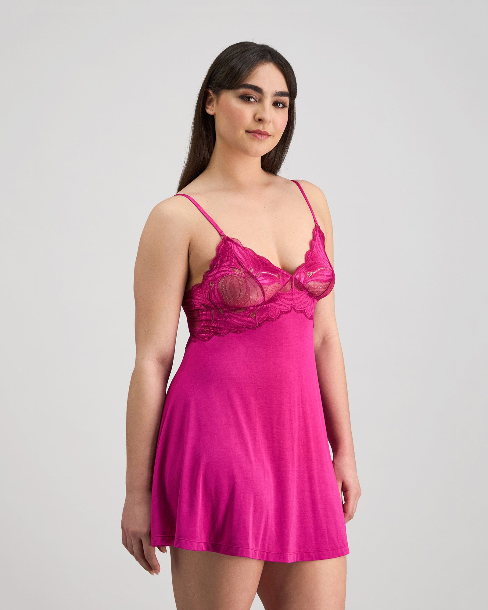 Model wears Siesta Chemise in FANTASY FUCHSIA. On body side view