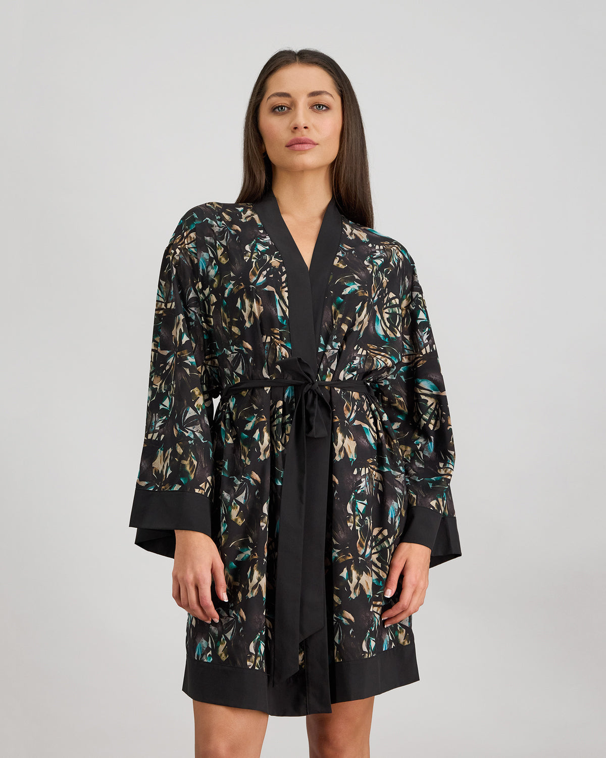 Model wears Lost Paradise Robe in BLACK PRINT. On body side view