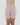 Model wears Smoothing Bodywear Chafer Short in CARAMEL. On body front view