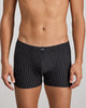 Model wears Cotton Stretch Mens Trunk in BLACK PINSTRIPE. On body front view