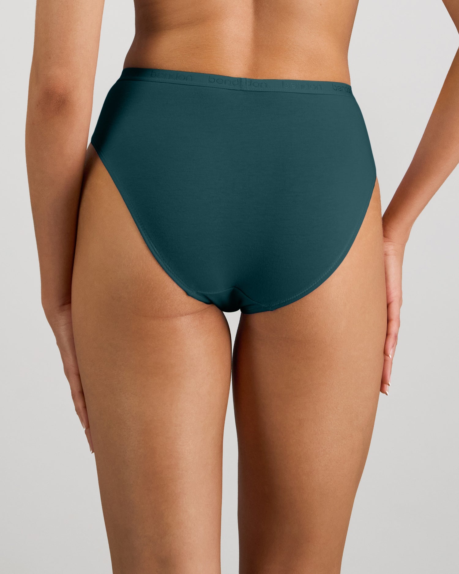 Model wears Body Cotton Bikini in MEDITERRANEA. On body back view