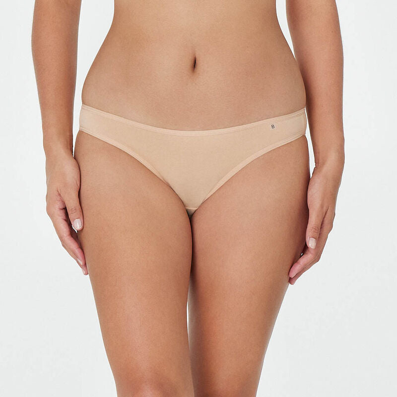 Model wears Clemence Bikini in AMERICAN NUDE. On body front view