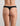 Model wears Extra-Ordinary Thong in BLACK. On body back view