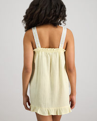Model wears Bonbon Babydoll in TRANSPARENT YELLOW. On body back view
