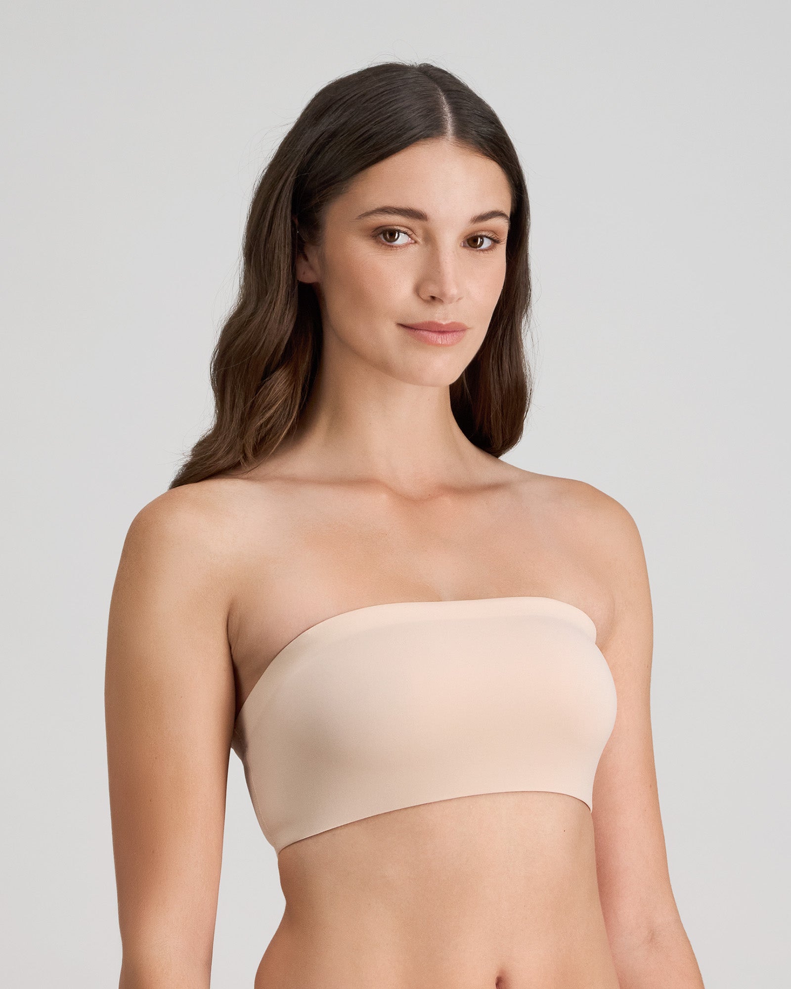 Model wears Extra-Ordinary Bandeau in LATTE. On body side view