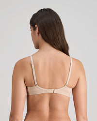 Model wears Extra-Ordinary Contour Bra in LATTE. On body back view